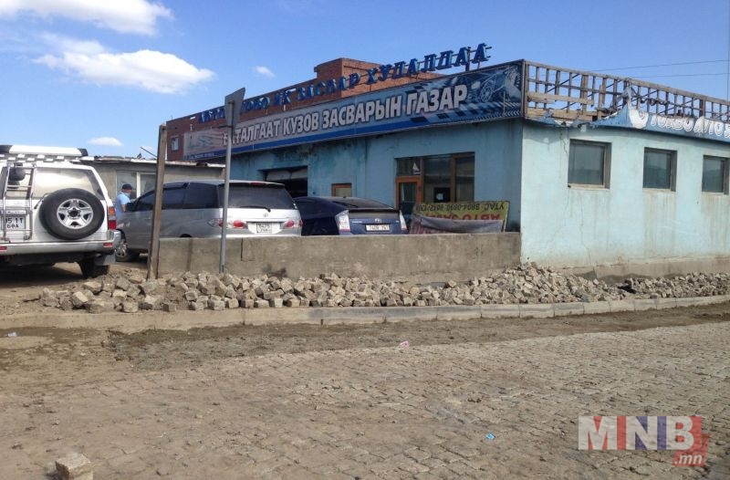 (Үерийн ус зайлуулах шугам хоолойг таглан зөвшөөрөлгүй барьсан байгууламж)