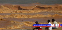 Бразилд нурсан далангийн ус далайд цутгаж эхэллээ